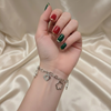 Sophisticated Silver-Toned Charm Bracelet – Contemporary Floral & Geometric Link Bracelet for Women