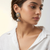 Dual-Tone Floral Heritage Oxidised Jhumka Earrings
